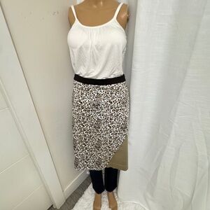 Waist 24”length 24” real pretty skirt camel with animal print cool cross design